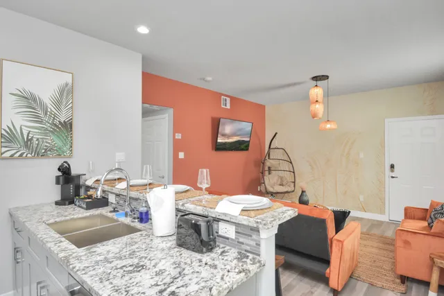 a dining room with a table and chairs