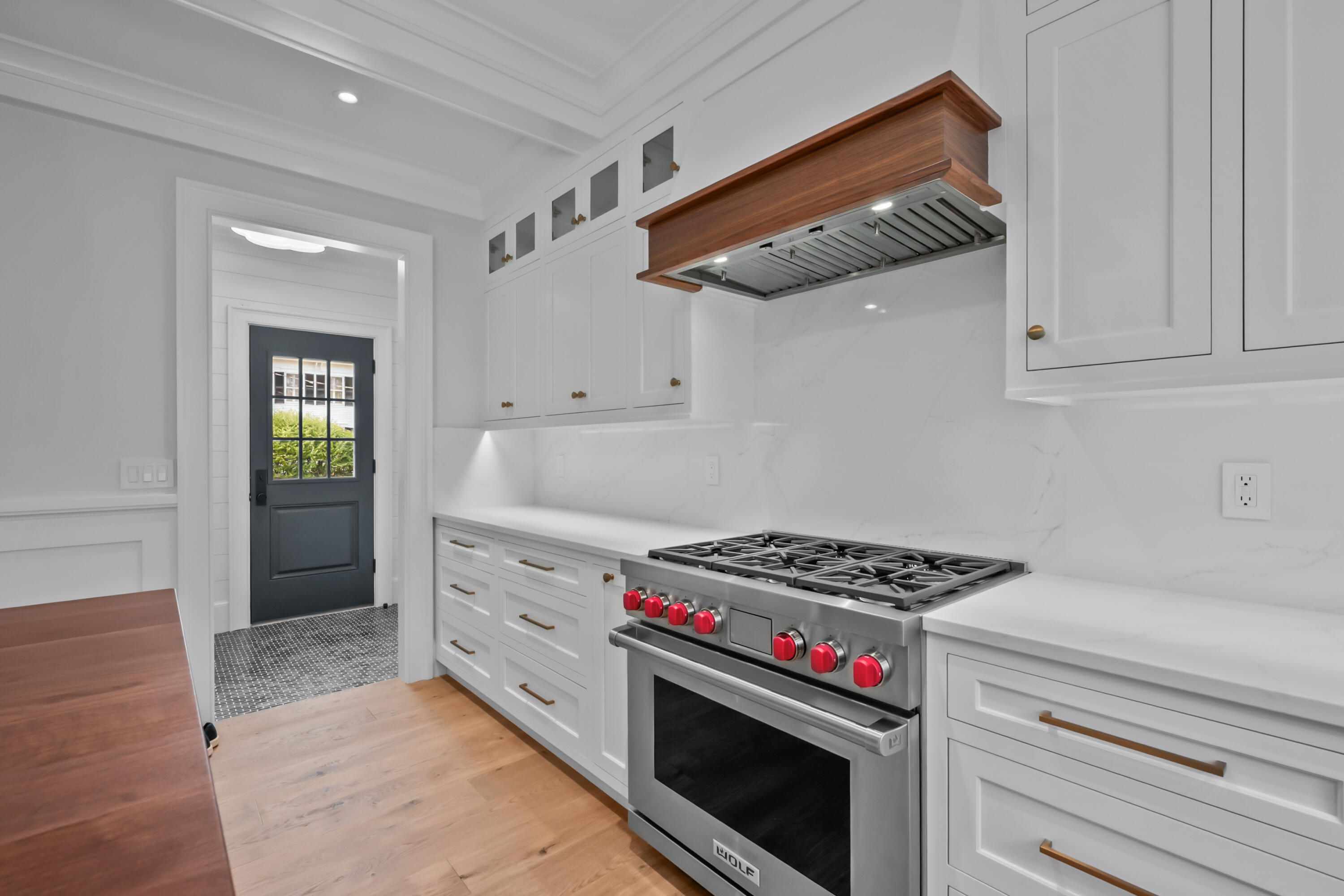 287 Cedar Street Chatham, MA 02633 - Photo 21 of 64 a kitchen with white cabinets and appliances