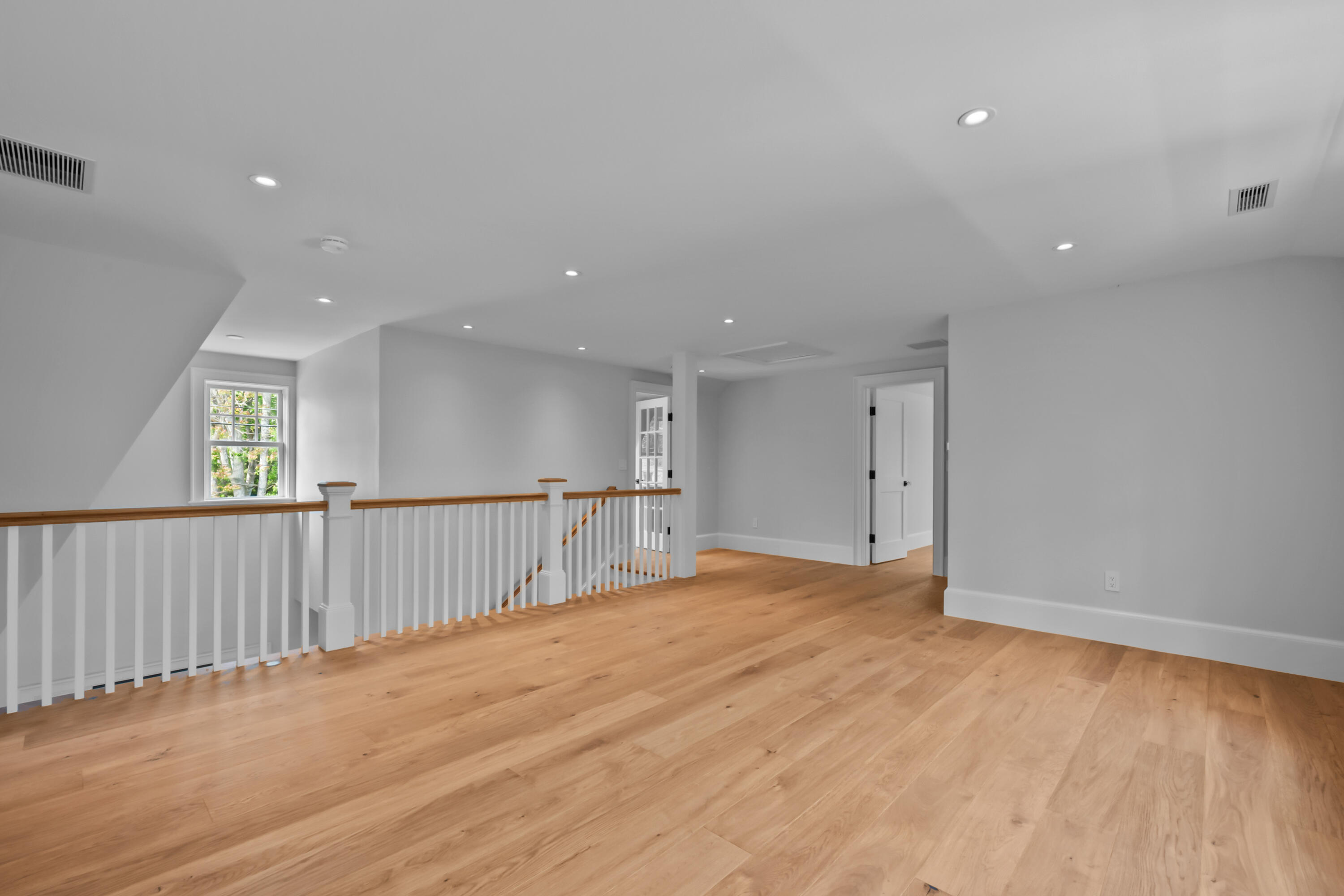 287 Cedar Street Chatham, MA 02633 - Photo 36 of 64 a view of empty room with wooden floor