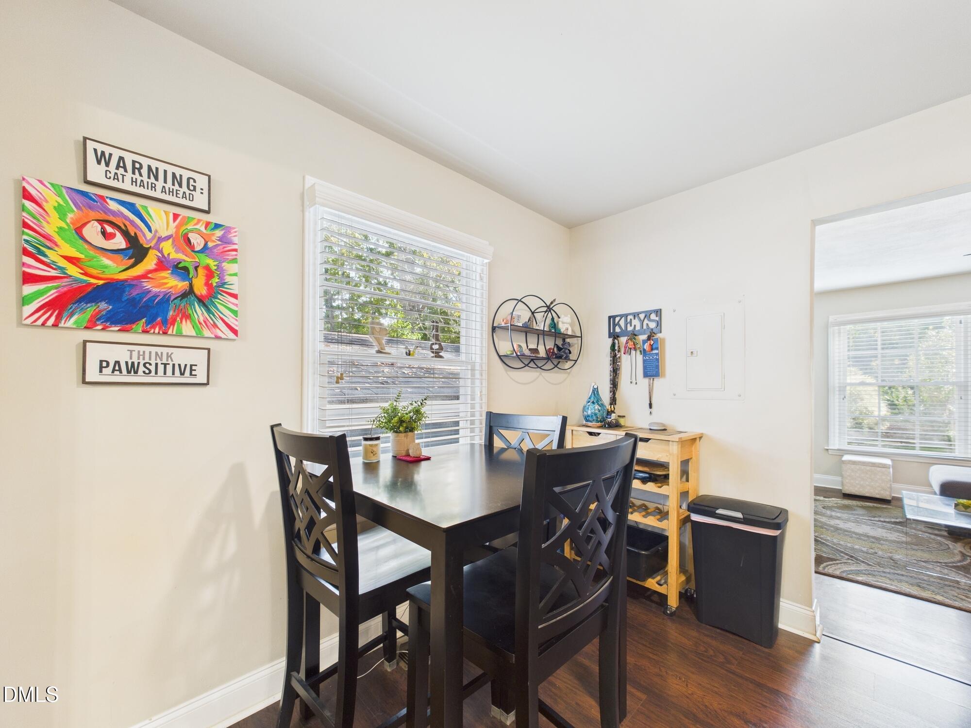 109 Blanchard Street Raleigh, NC 27603 - Photo 14 of 57 a view of a dining room with furniture window and wooden floor