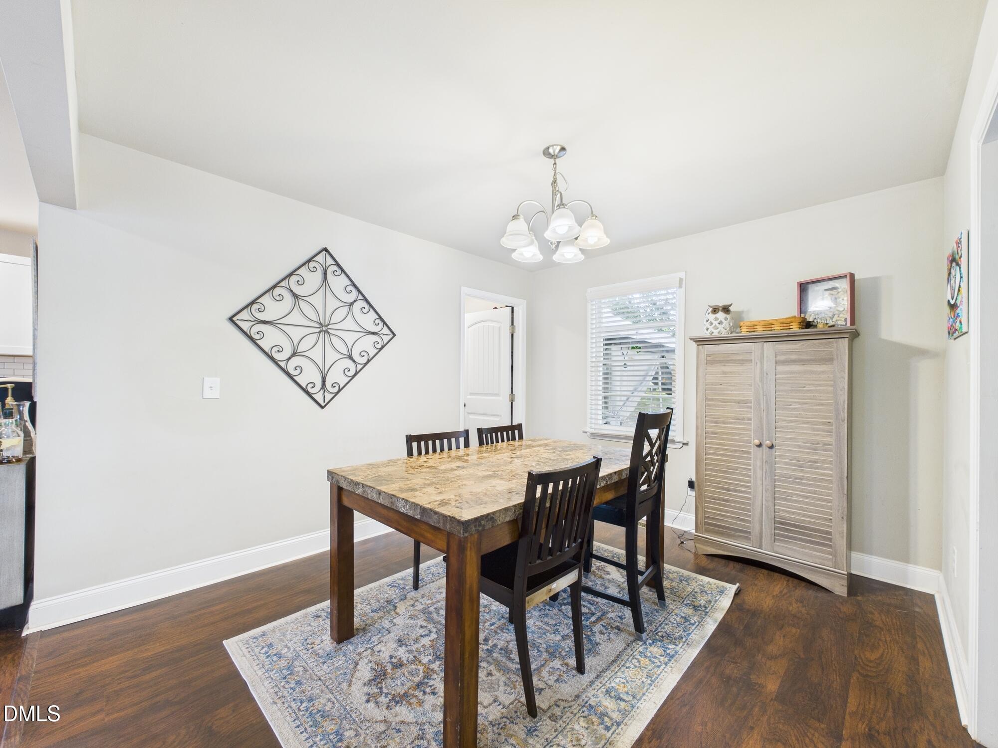 109 Blanchard Street Raleigh, NC 27603 - Photo 21 of 57 a view of a dining room with furniture