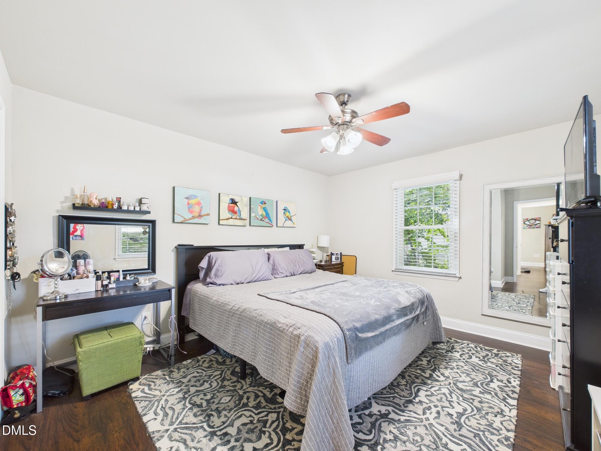 109 Blanchard Street Raleigh, NC 27603 - Photo 24 of 57 a bedroom with a bed furniture and a window