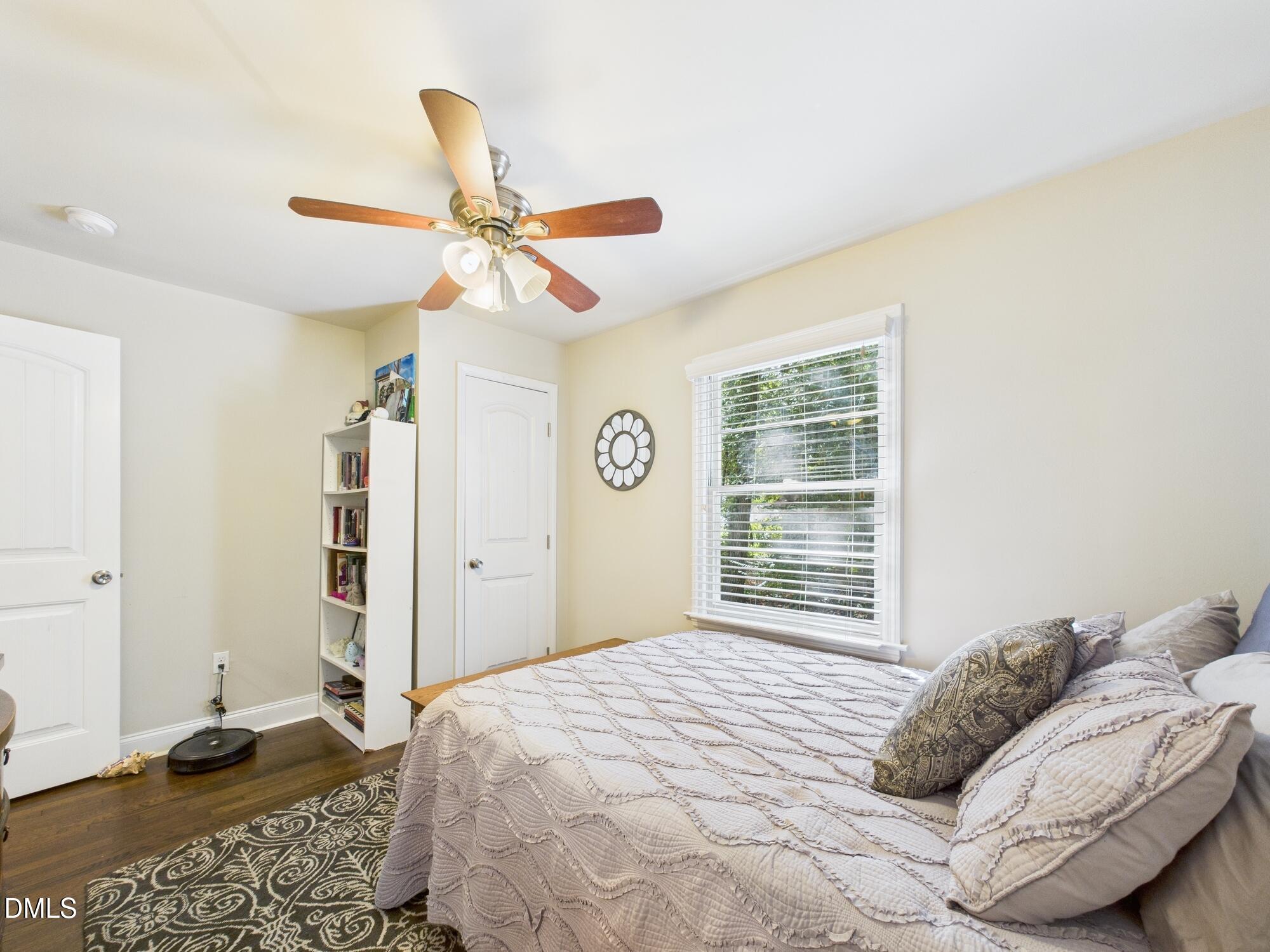 109 Blanchard Street Raleigh, NC 27603 - Photo 29 of 57 a bedroom with a bed and a window