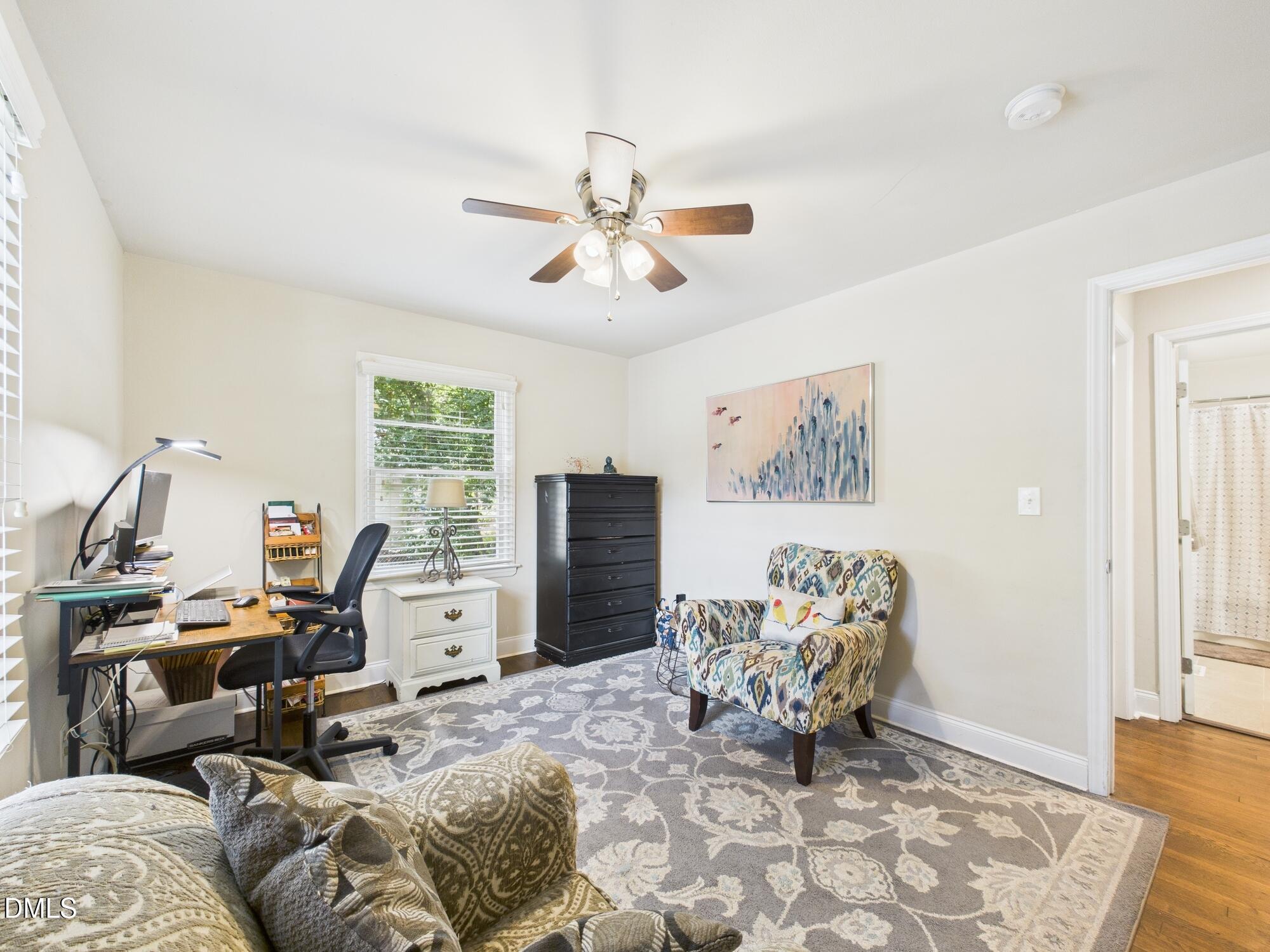109 Blanchard Street Raleigh, NC 27603 - Photo 35 of 57 a living room with furniture and a window
