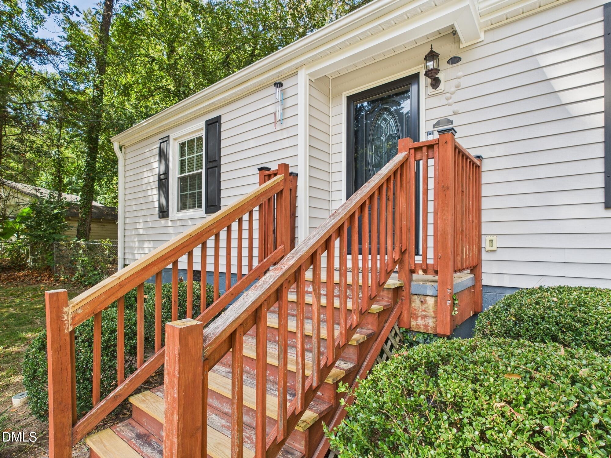 109 Blanchard Street Raleigh, NC 27603 - Photo 4 of 57 a balcony view with staircase