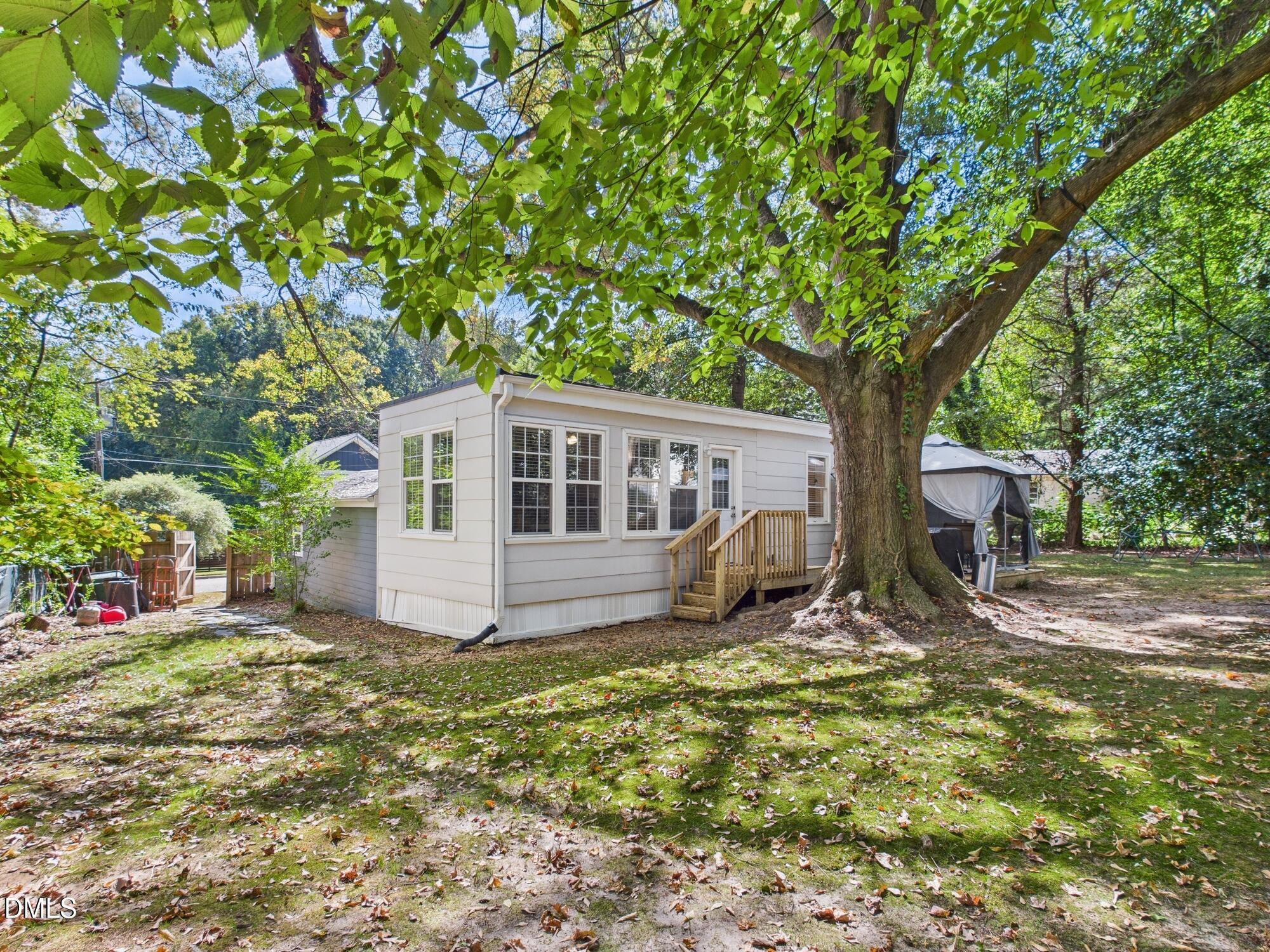109 Blanchard Street Raleigh, NC 27603 - Photo 41 of 57 a view of a house with backyard
