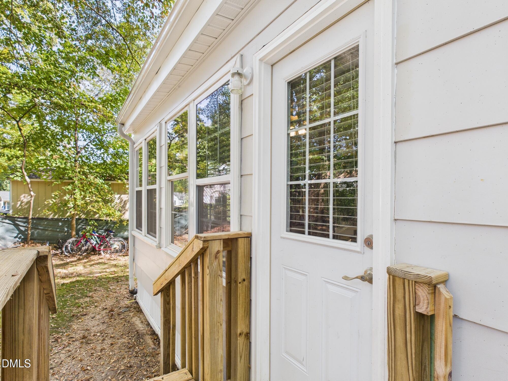 109 Blanchard Street Raleigh, NC 27603 - Photo 46 of 57 a view of house with backyard and porch