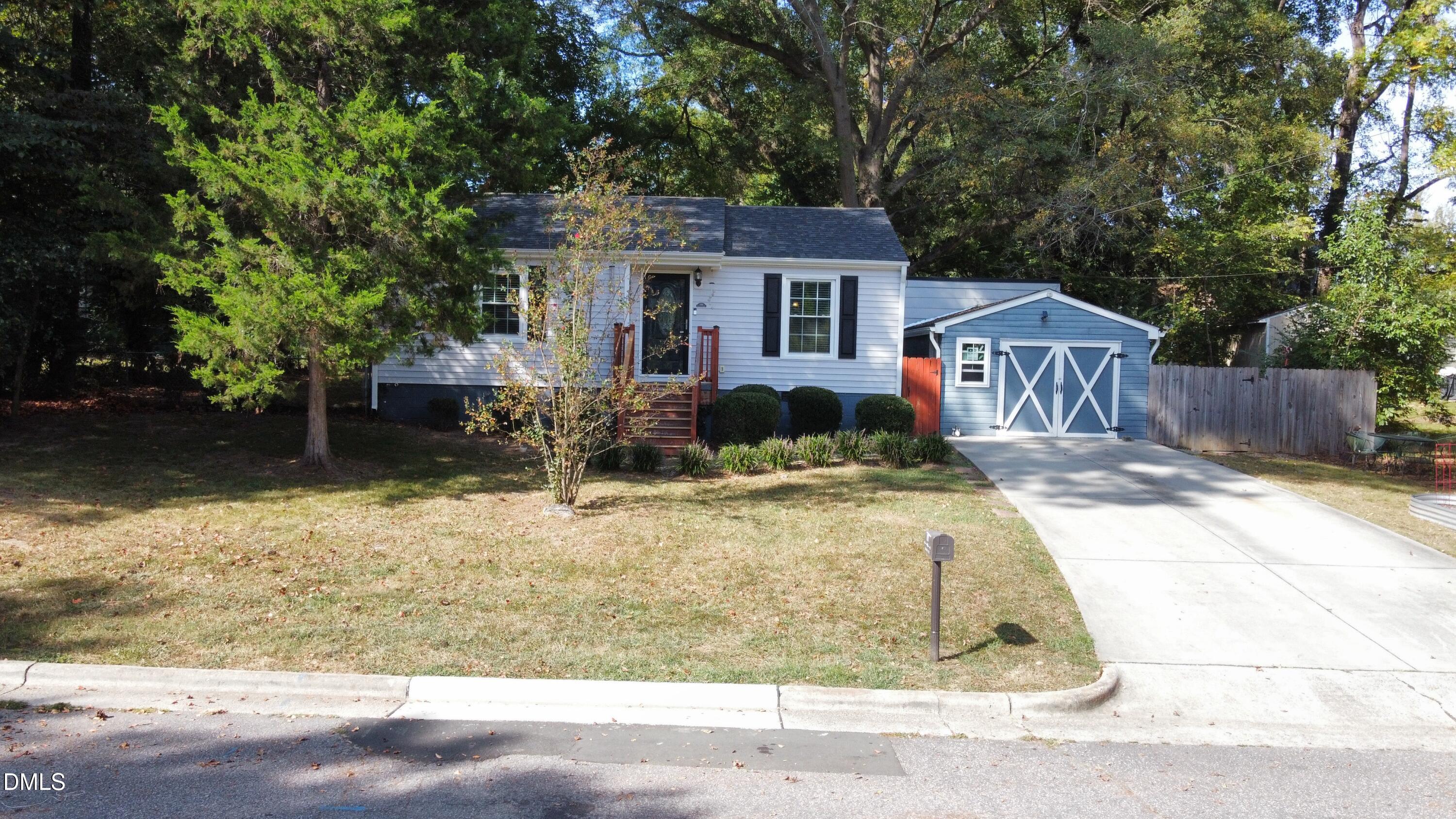 109 Blanchard Street Raleigh, NC 27603 - Photo 52 of 57 front view of a house with a patio