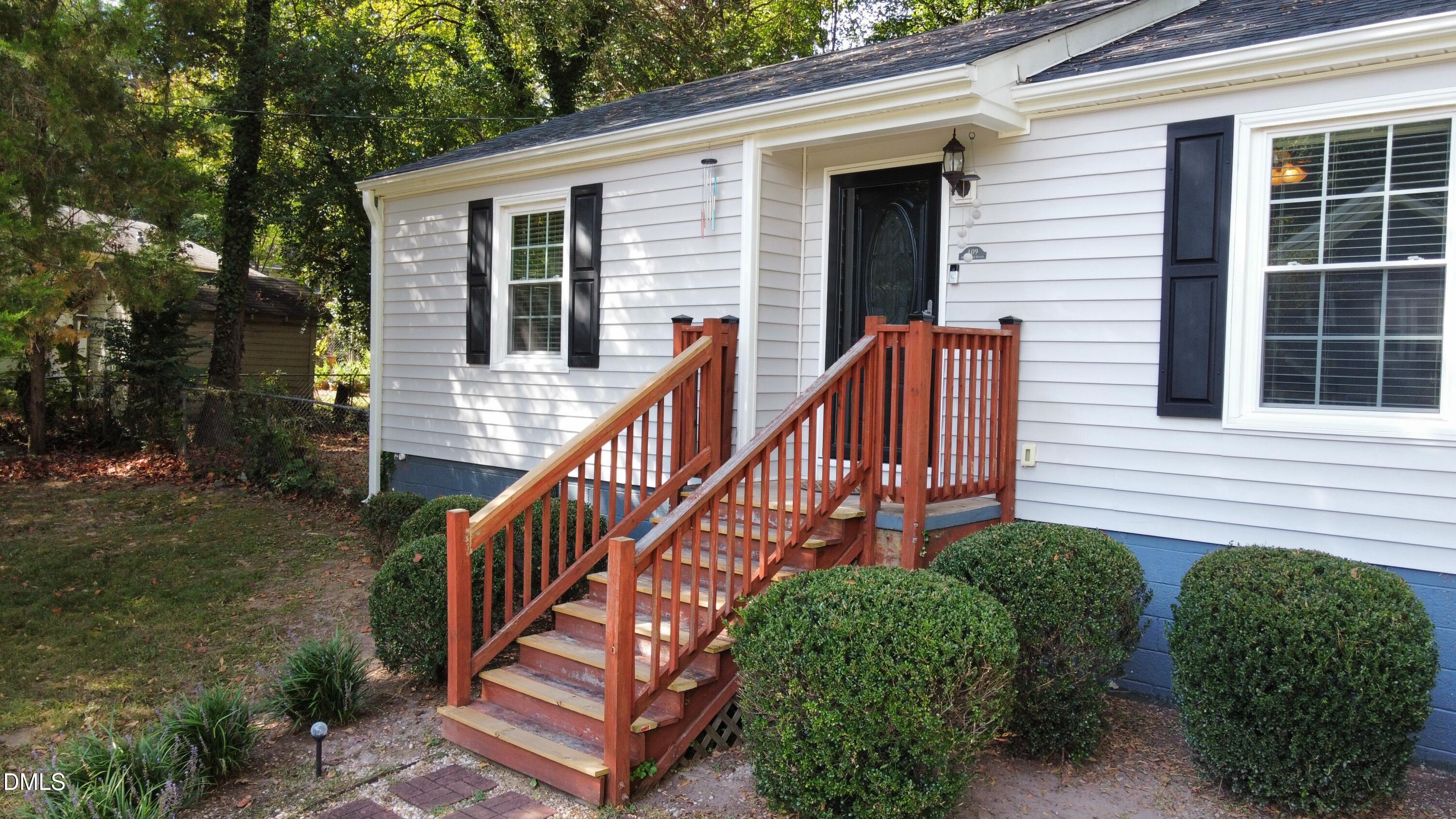 109 Blanchard Street Raleigh, NC 27603 - Photo 53 of 57 a view of a house with backyard and porch