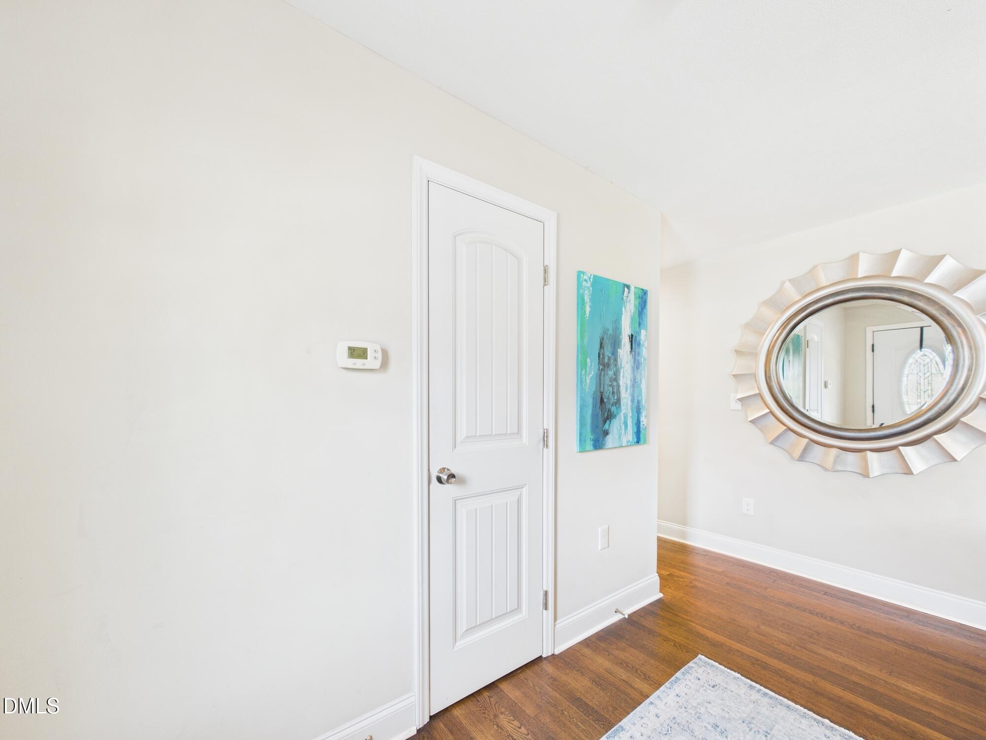109 Blanchard Street Raleigh, NC 27603 - Photo 8 of 57 a view of a bedroom with wooden floor and window