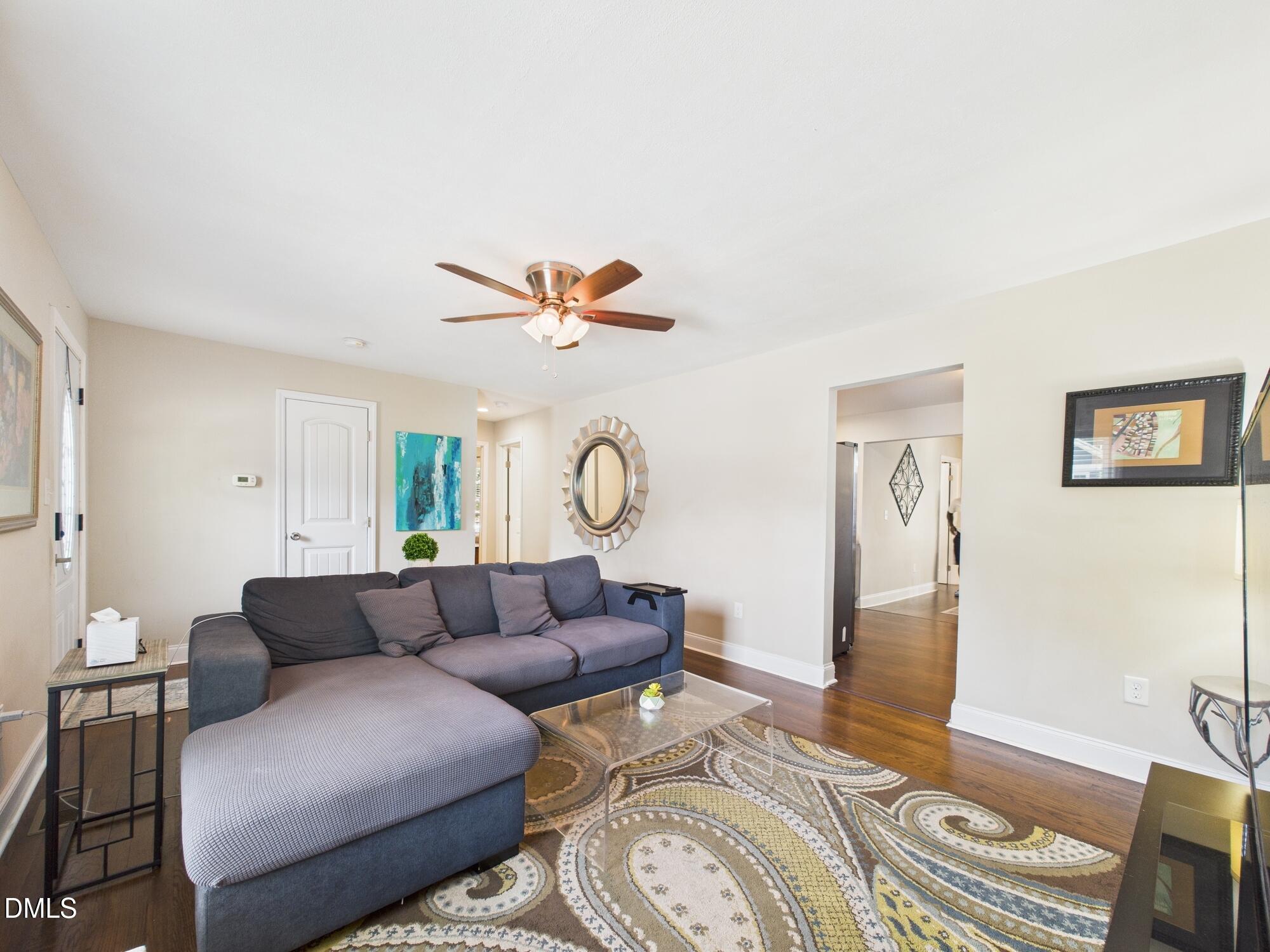 109 Blanchard Street Raleigh, NC 27603 - Photo 10 of 57 a living room with furniture and a window