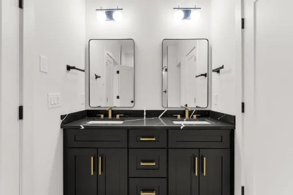 a bathroom with a shower and a sink