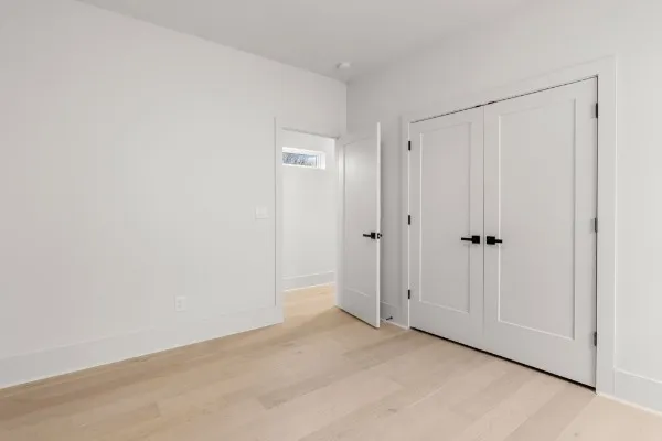 a bathroom with a shower and toilet