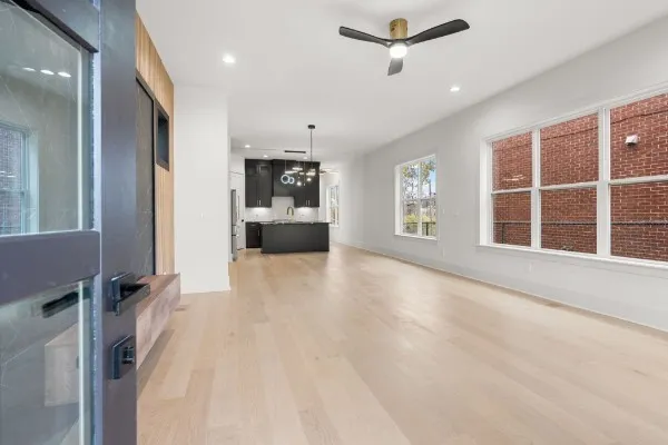 a view of livingroom with hardwood floor and a window