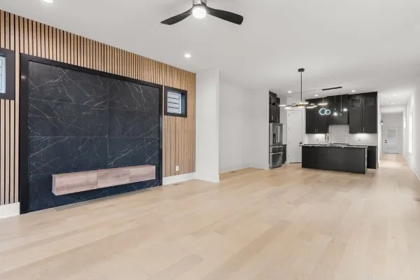 a view of kitchen and refrigerator
