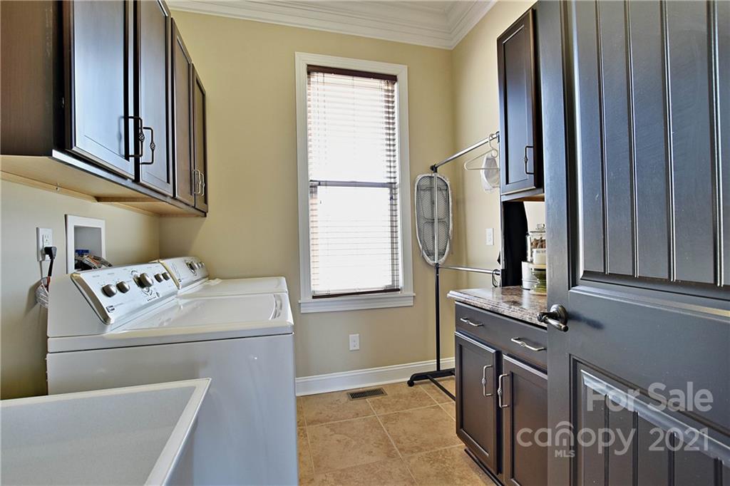 3822 Zebulon Williams Road Monroe, NC 28110 - Photo 27 of 36 a utility room with dryer and washer