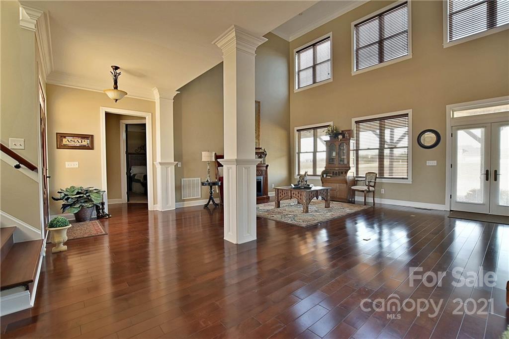 3822 Zebulon Williams Road Monroe, NC 28110 - Photo 6 of 36 a view of living room with hardwood floor and windows