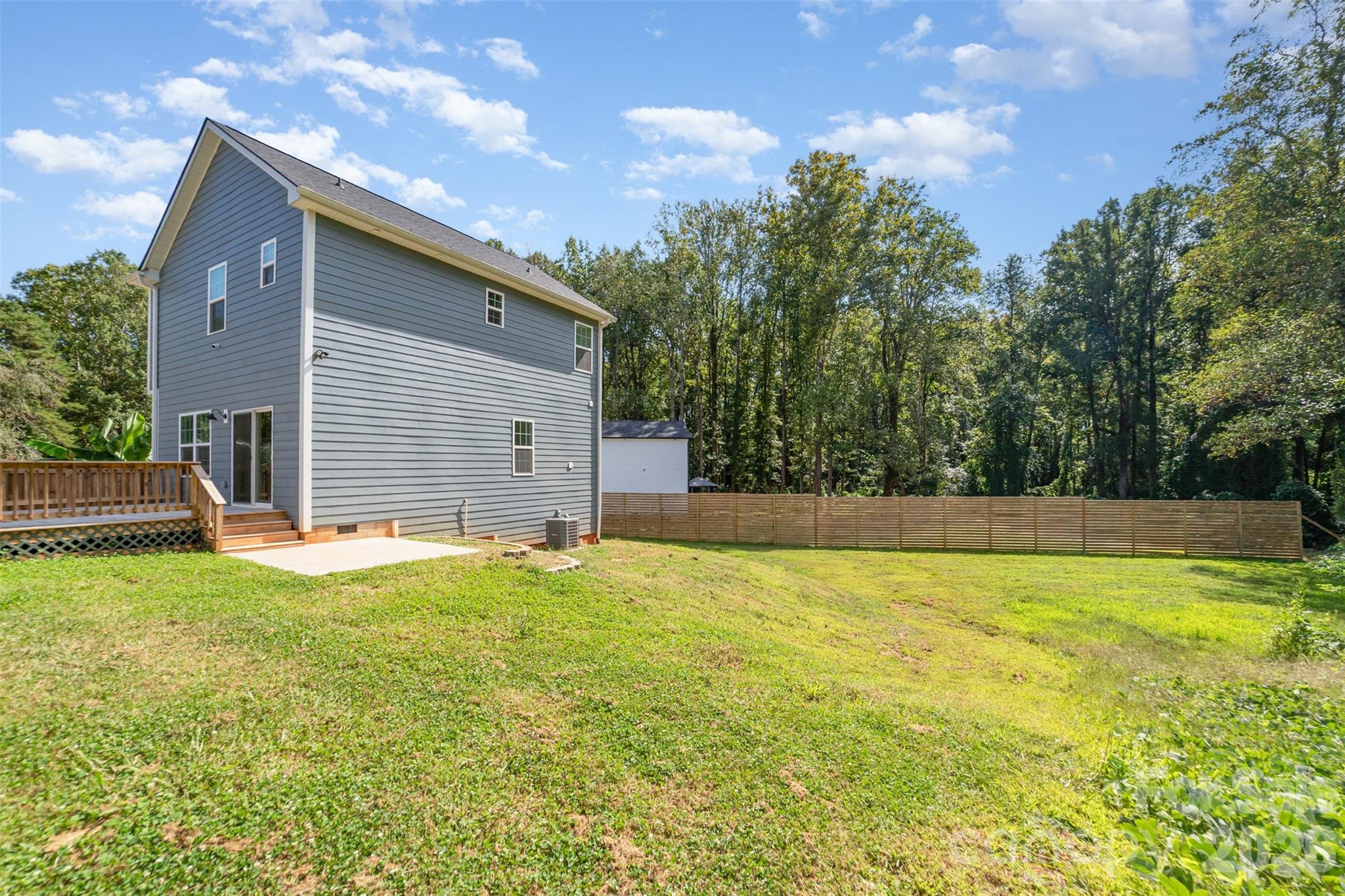 1003 Hunter Valley Road Shelby, NC 28150 - Photo 20 of 23 a view of a house with pool and a yard