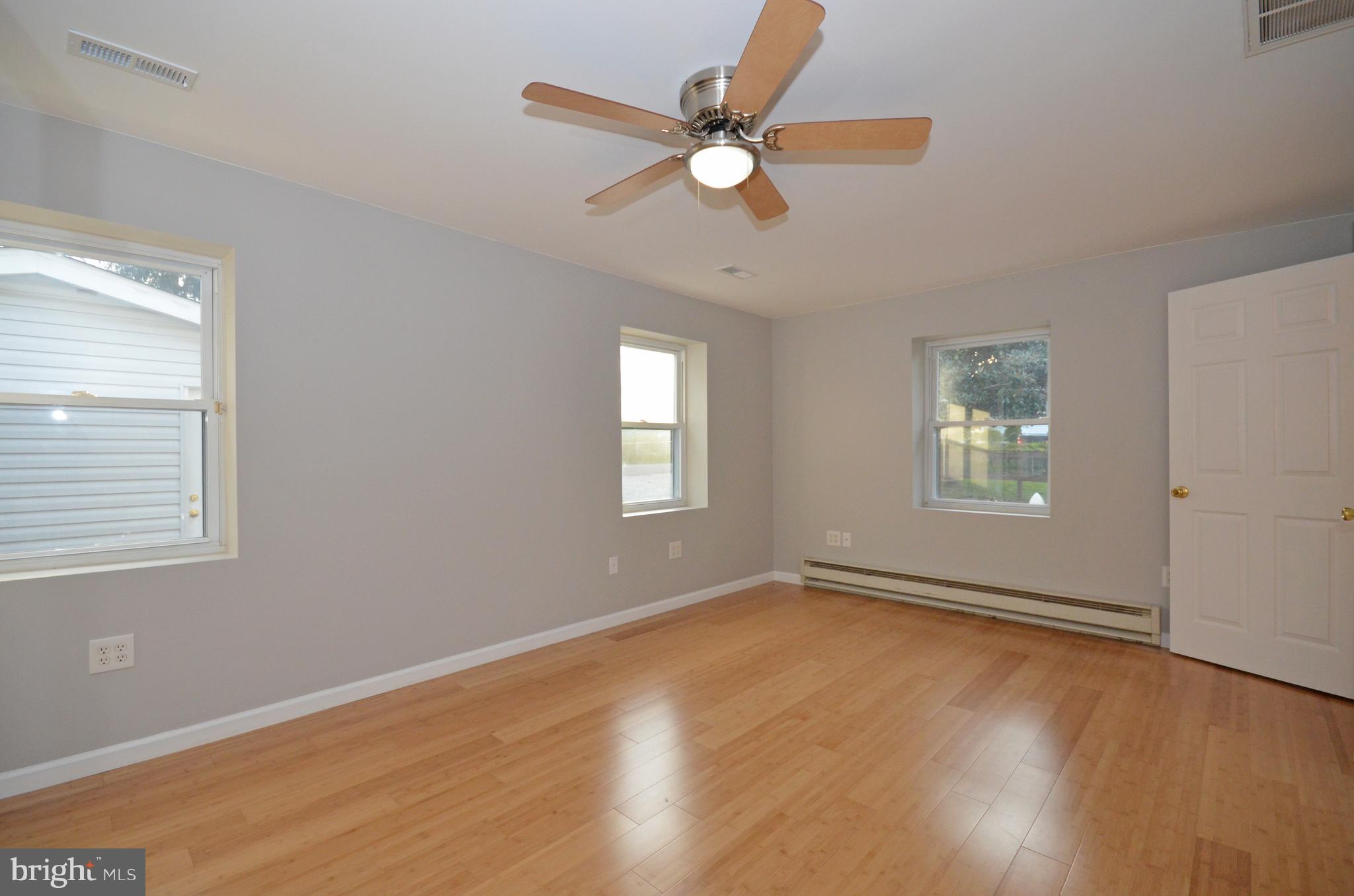 1924 Poplar Road Essex, MD 21221 - Photo 22 of 35 Master BR, plenty of light, ceiling fan, lg closet