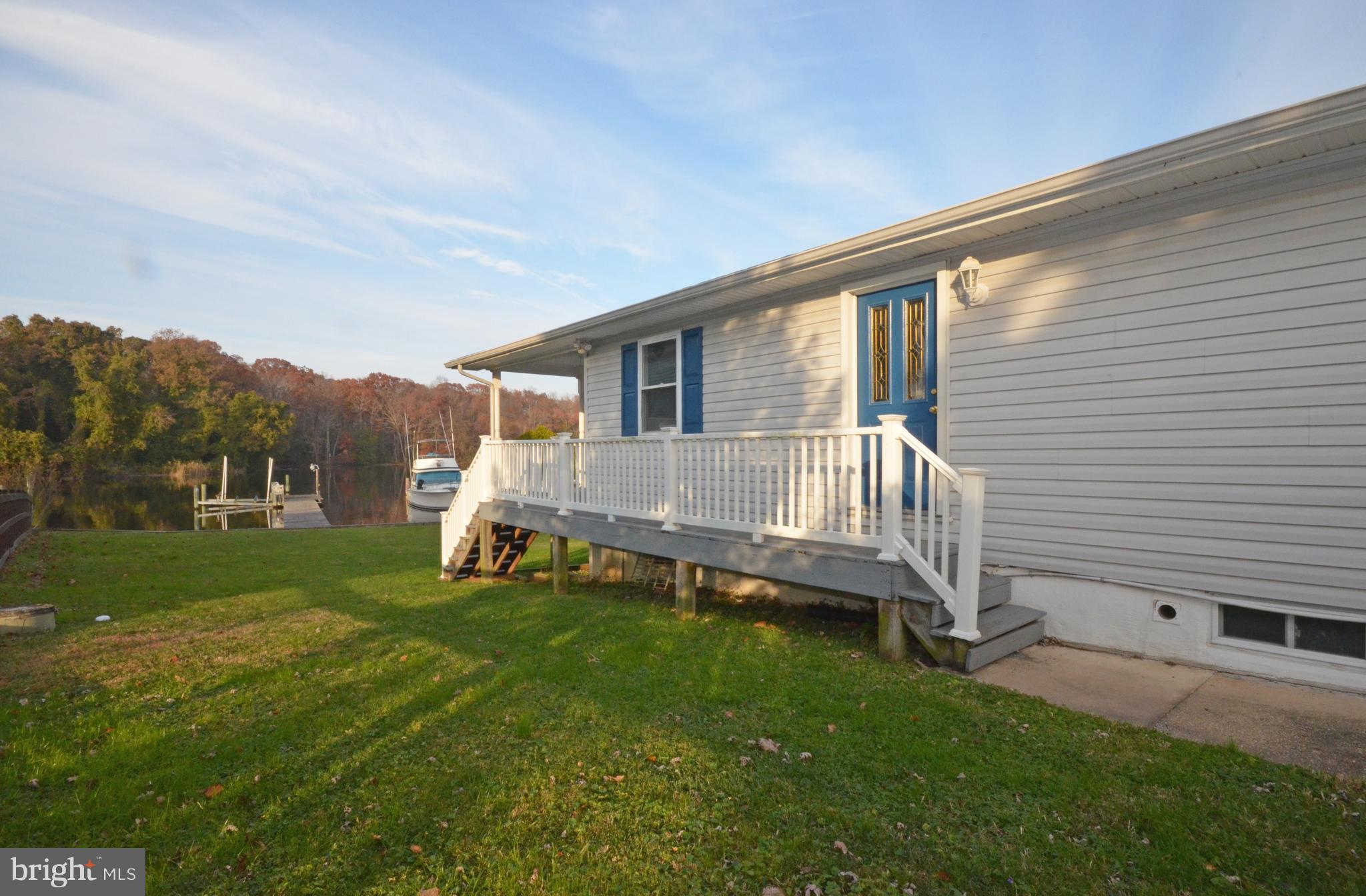 1924 Poplar Road Essex, MD 21221 - Photo 8 of 35 Side yard, covered porch with beautiful views!