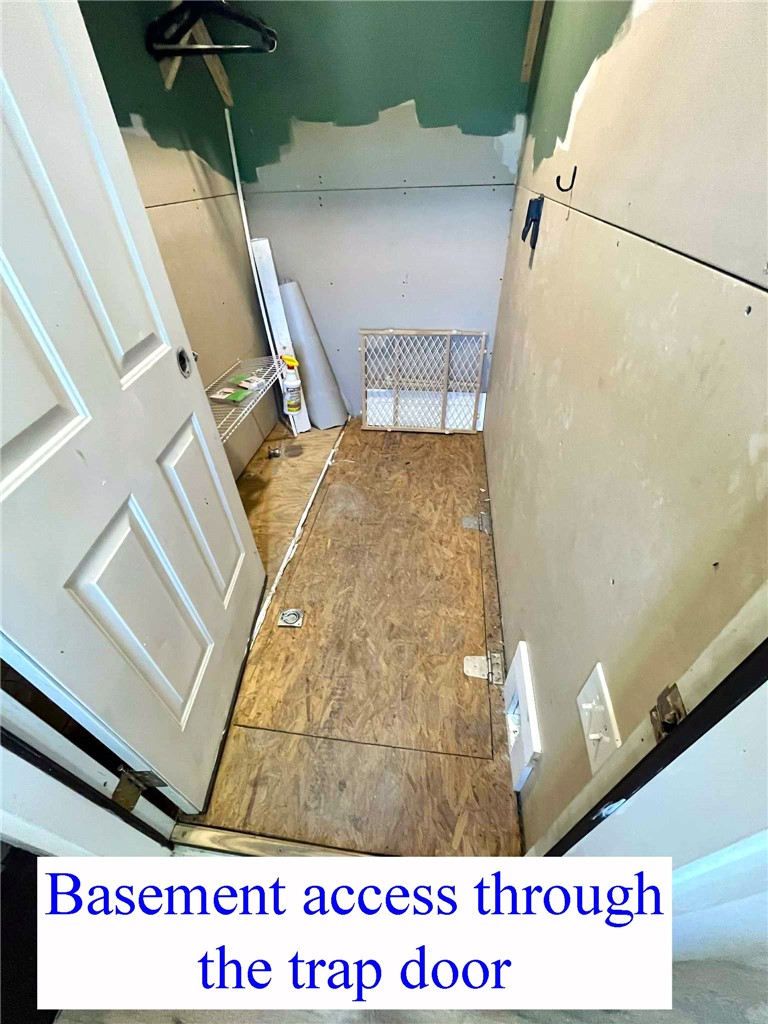 2095 Schilling Road Palmyra, NY 14522 - Photo 7 of 40 Front closet with basement access