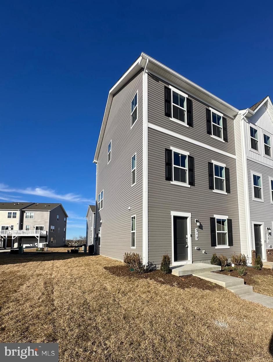 317 Short Br Drive Ranson, WV 25438 - Photo 2 of 41 a front view of a house with a yard