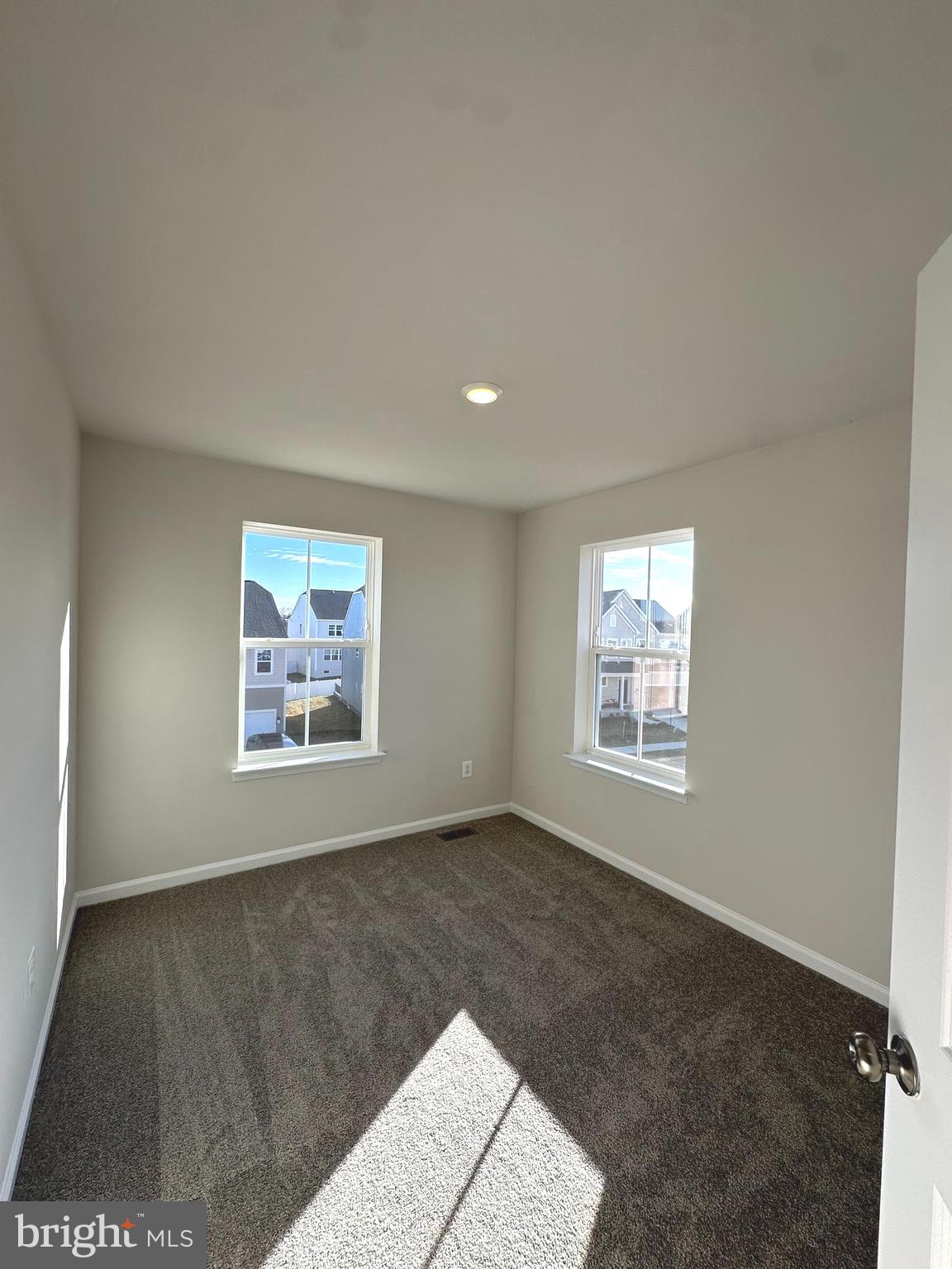 317 Short Br Drive Ranson, WV 25438 - Photo 29 of 41 a view of a big room with windows and chandelier fan