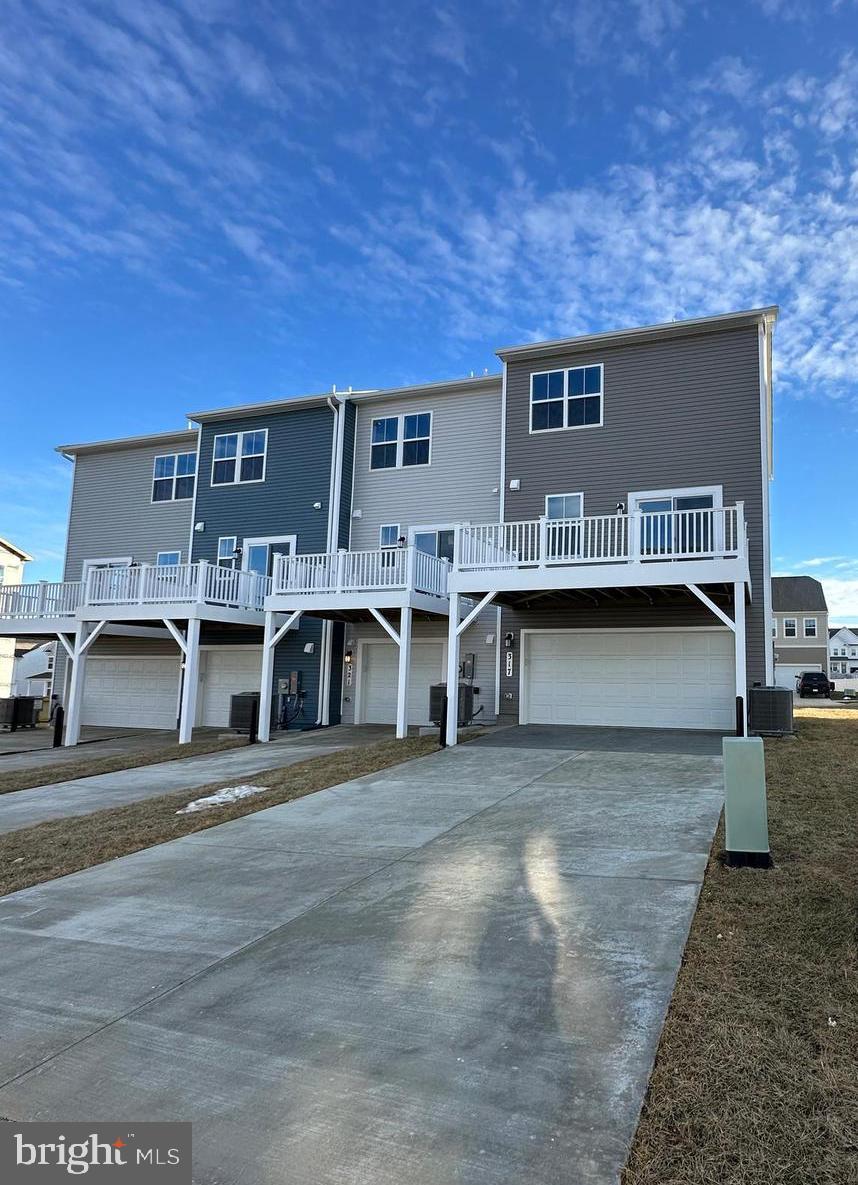 317 Short Br Drive Ranson, WV 25438 - Photo 5 of 41 a front view of a house with large windows