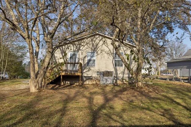 a view of house with outdoor space