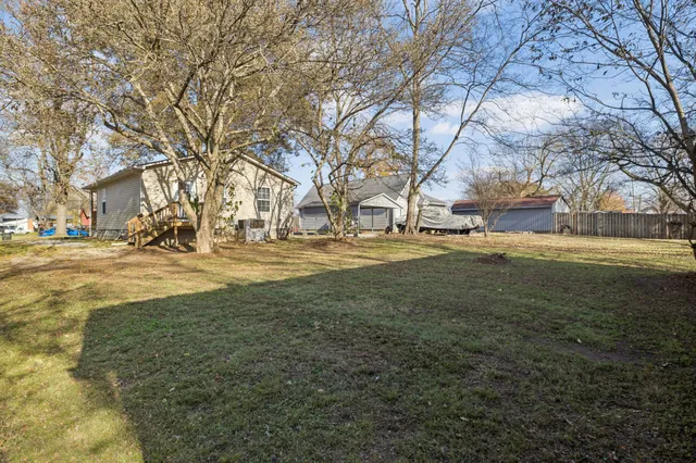 a view of road with yard