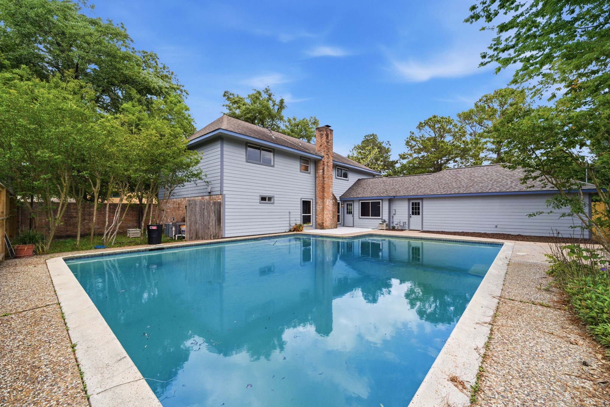 8131 Theisswood Road Spring, TX 77379 - Photo 30 of 31 In ground pool surrounded by privacy fence