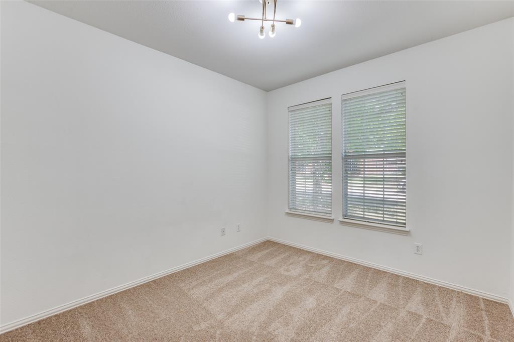 13371 Lime Ridge Drive Frisco, TX 75033 - Photo 20 of 25 This room features neutral-toned carpet, white walls, and two windows with blinds