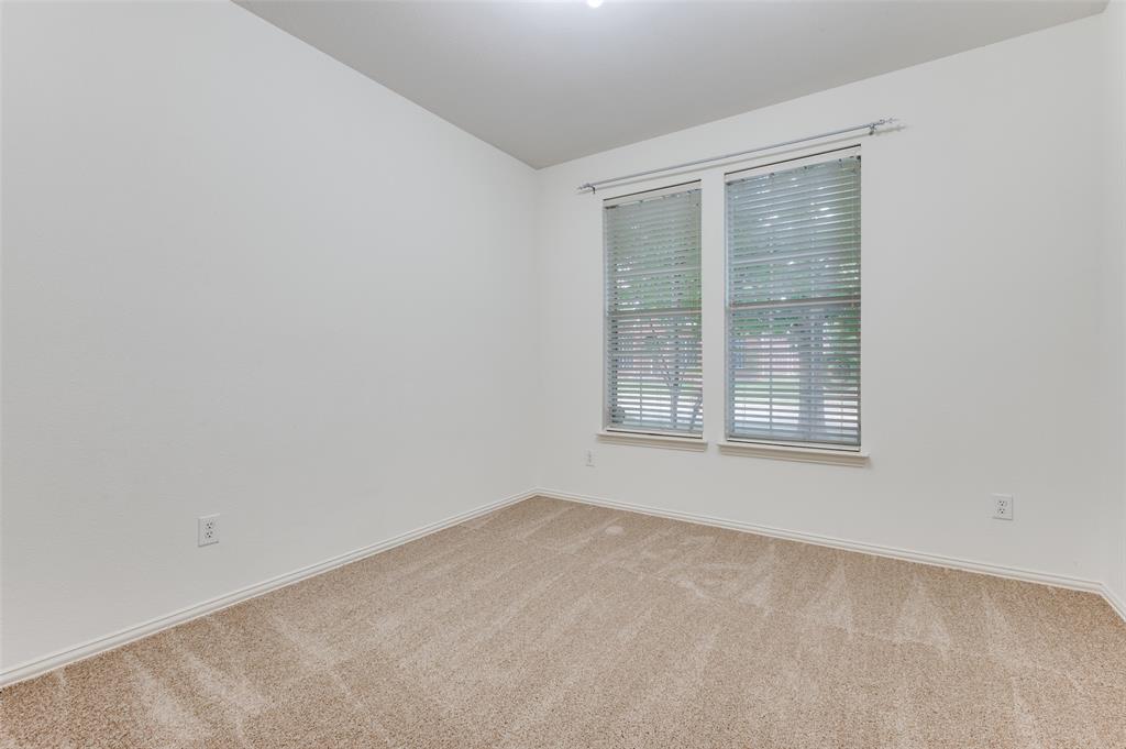 13371 Lime Ridge Drive Frisco, TX 75033 - Photo 21 of 25 Room featuring light-colored carpet, white walls, and a window with blinds