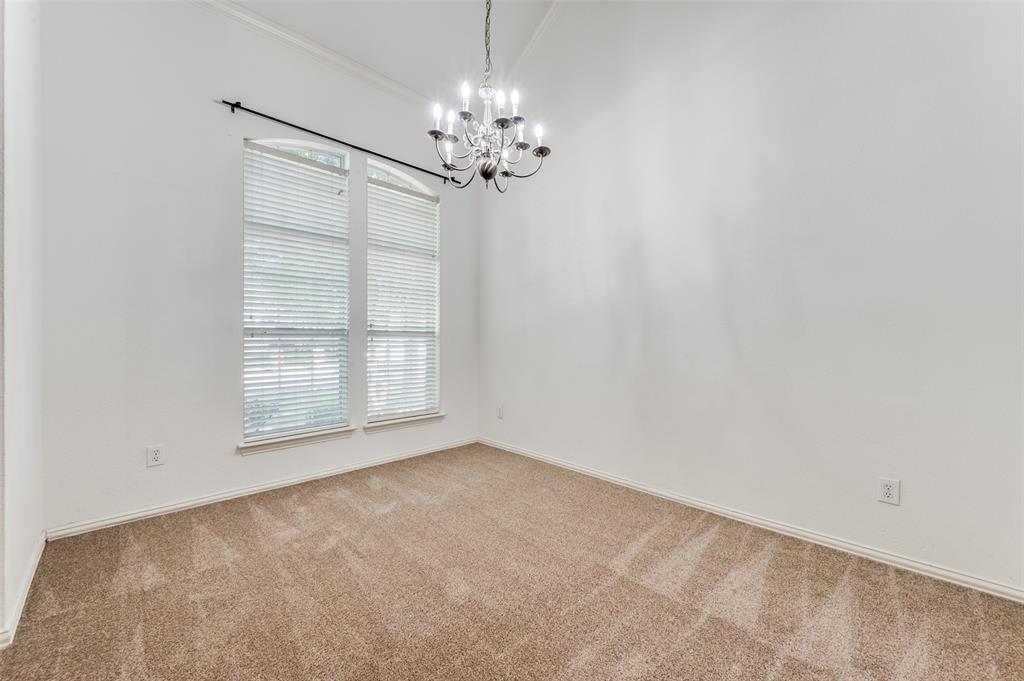 13371 Lime Ridge Drive Frisco, TX 75033 - Photo 4 of 25 This room features a high ceiling, carpeted flooring, and a decorative chandelier