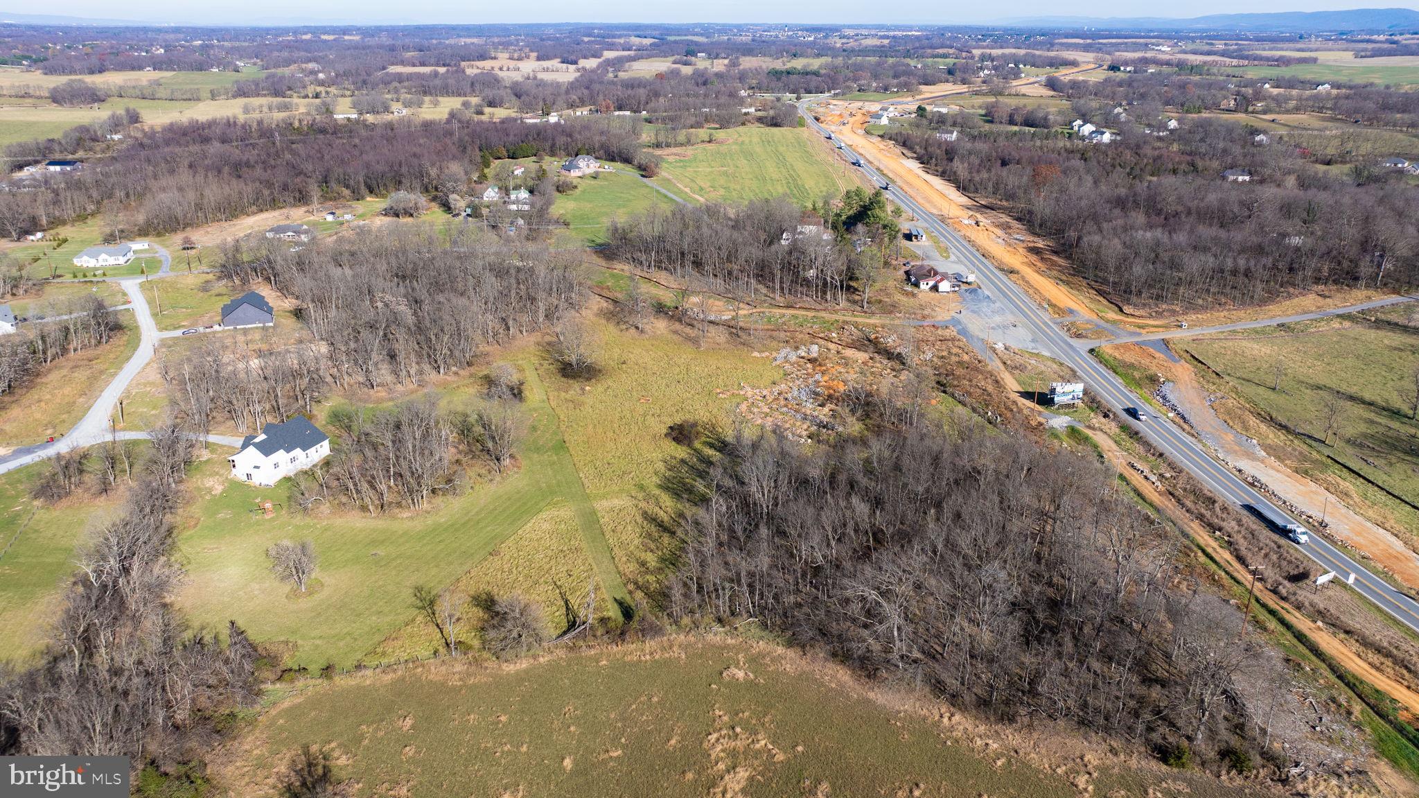 Lewisville Rd Summit Point Summit Point, WV 25446 - Photo 9 of 29 a view of a lake with mountains in the background