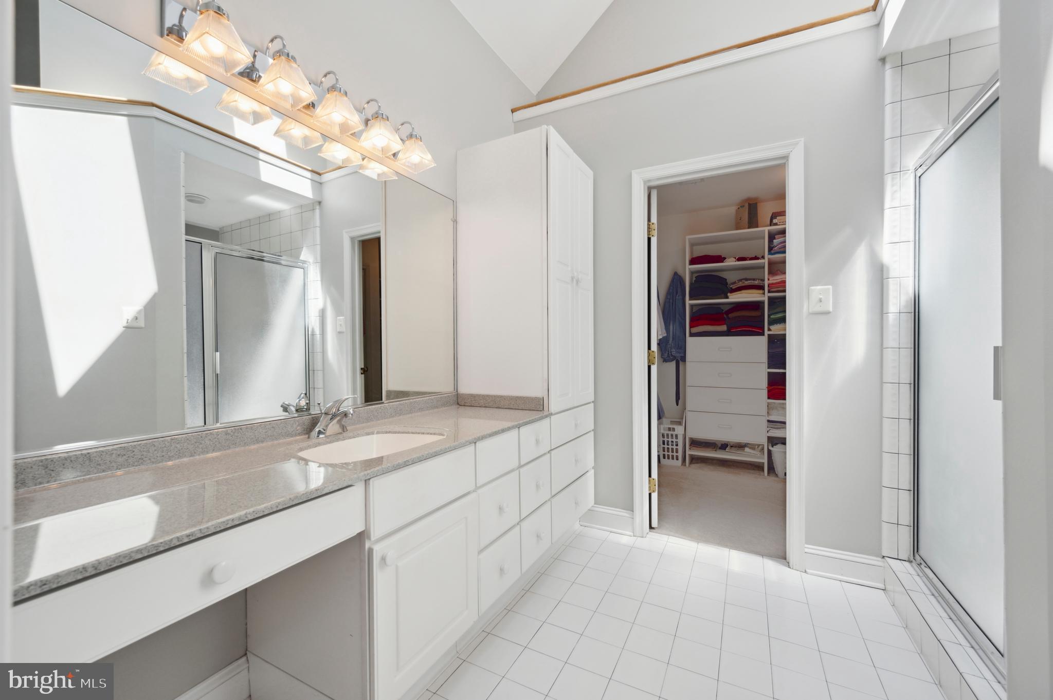 4 Stoney End Road Broomall, PA 19008 - Photo 38 of 50 Long vanity leading to #1walk in closet in primary