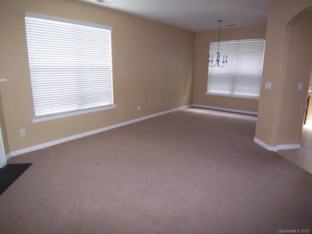 2117 Midnight Blue Lane, Unit 194 Fort Mill, SC 29708 - Photo 3 of 11 a view of an empty room with a window