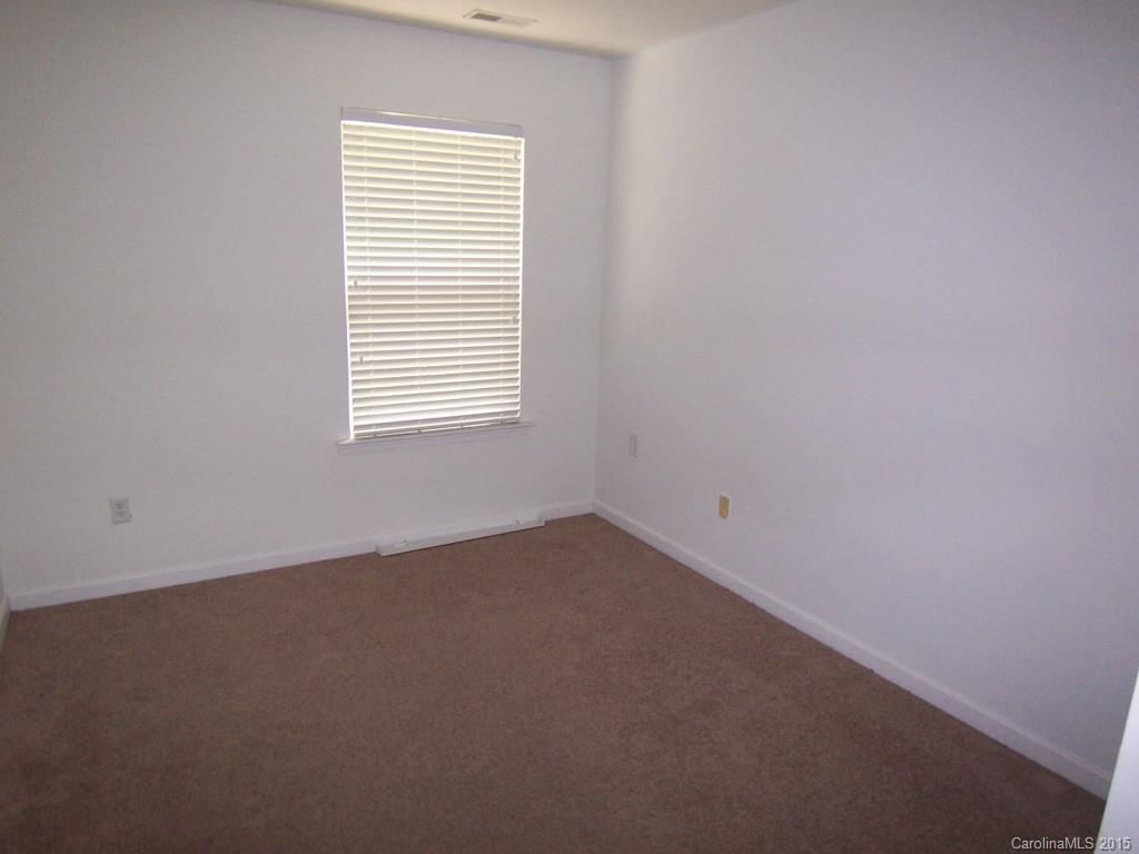 2117 Midnight Blue Lane, Unit 194 Fort Mill, SC 29708 - Photo 9 of 11 an empty room with a window
