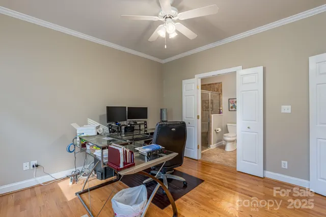a workspace with furniture and wooden floor