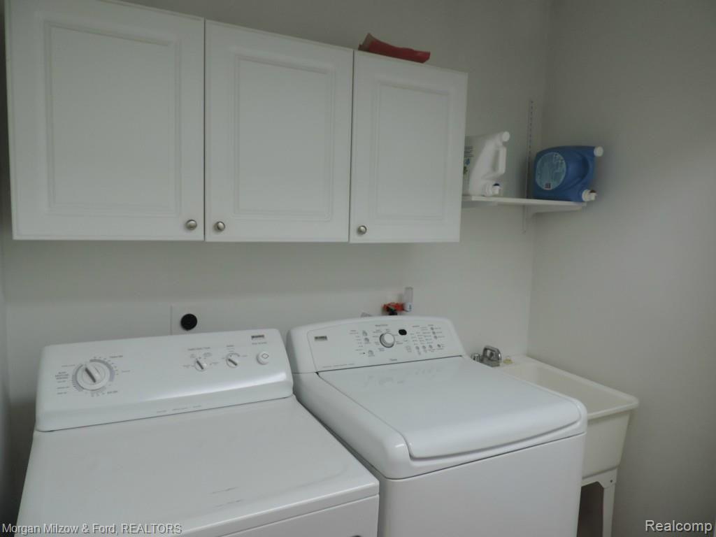 7900 Foster Road Clarkston, MI 48346 - Photo 13 of 30 First floor laundry