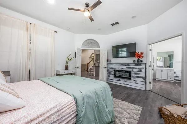 a room with sink and mirror