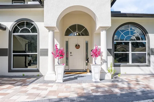 a front view of a house with a porch