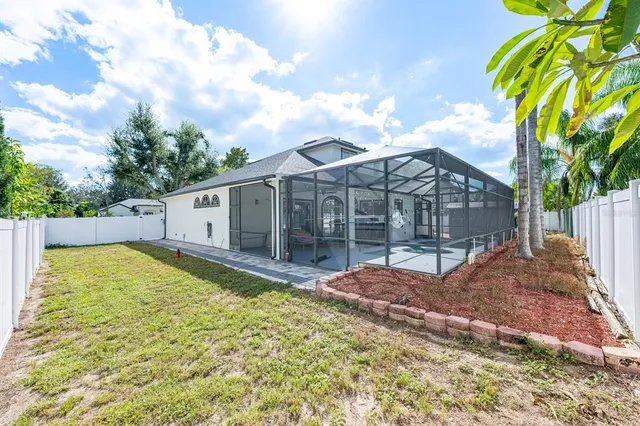 a view of a backyard with a patio