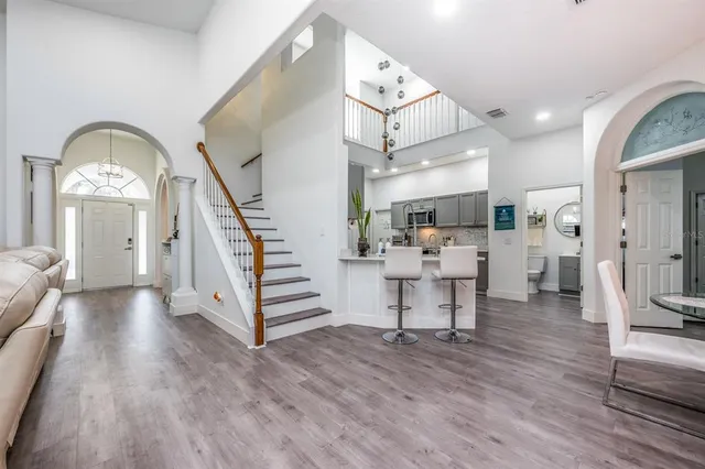 a view of a living room and a wooden floor