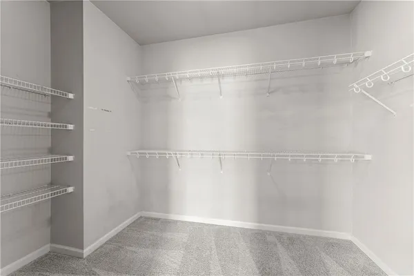 a view of a room with racks on the wall