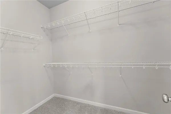 a view of a room with racks on the wall