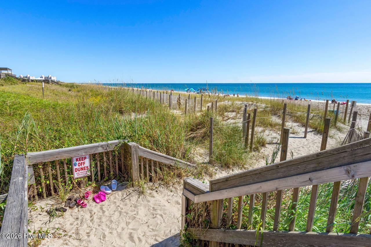9201 Coast Guard Road, Unit F202 Emerald Isle, NC 28594 - Photo 35 of 44 33-web-or-mls-PB-OS-Walkway-3