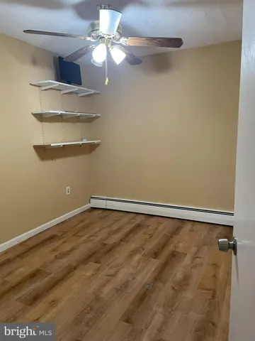 a view of a room with racks on the wall