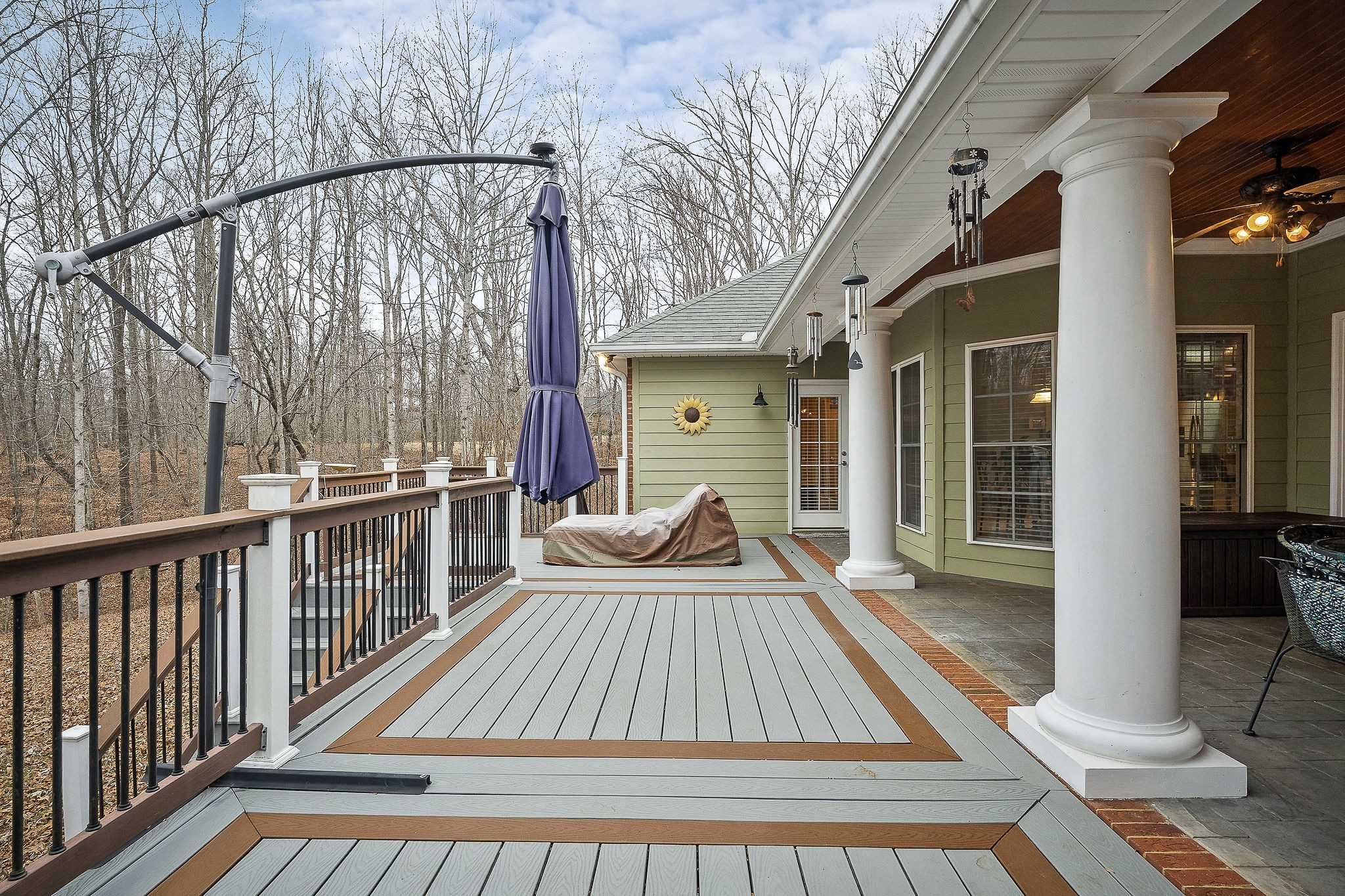 120 Dunrobin Court Sparta, TN 38583 - Photo 15 of 42 a view of backyard with a balcony and wooden floor