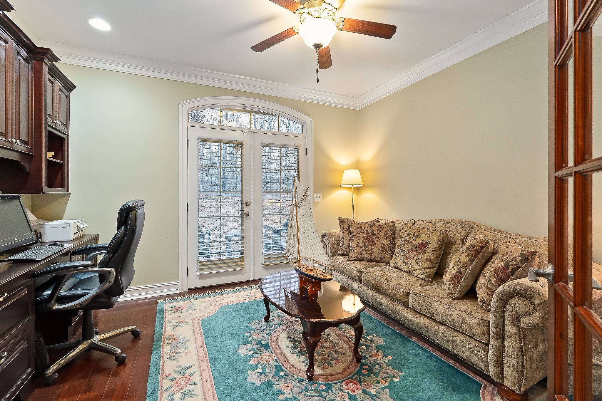 120 Dunrobin Court Sparta, TN 38583 - Photo 22 of 42 a living room with furniture a desk and chair with wooden floor